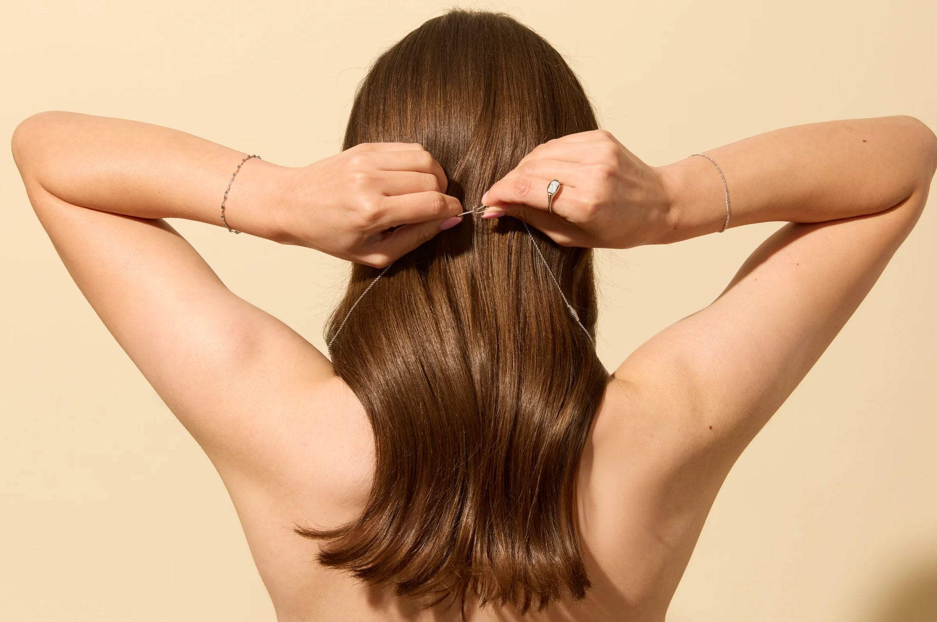 Put on your necklace solo using Claspe’s easy-to-fasten jewelry clasp – perfect for women with long nails, short nails, or limited mobility